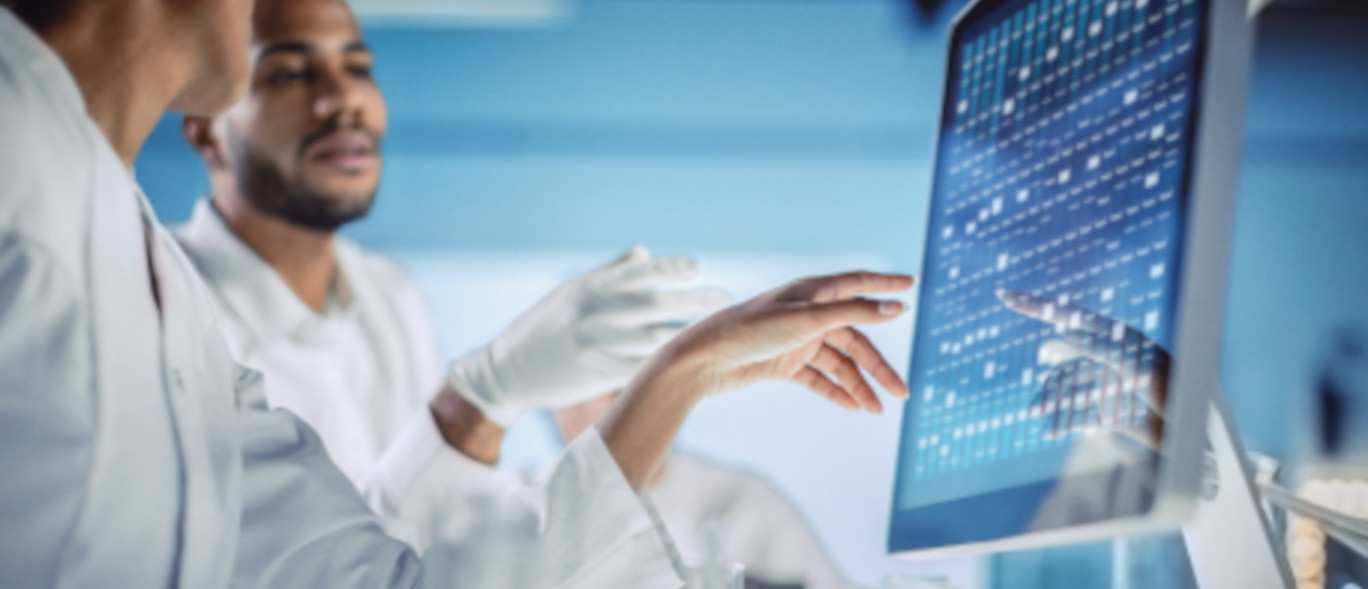 Scientists Working in The Laboratory, Using Touch Screen